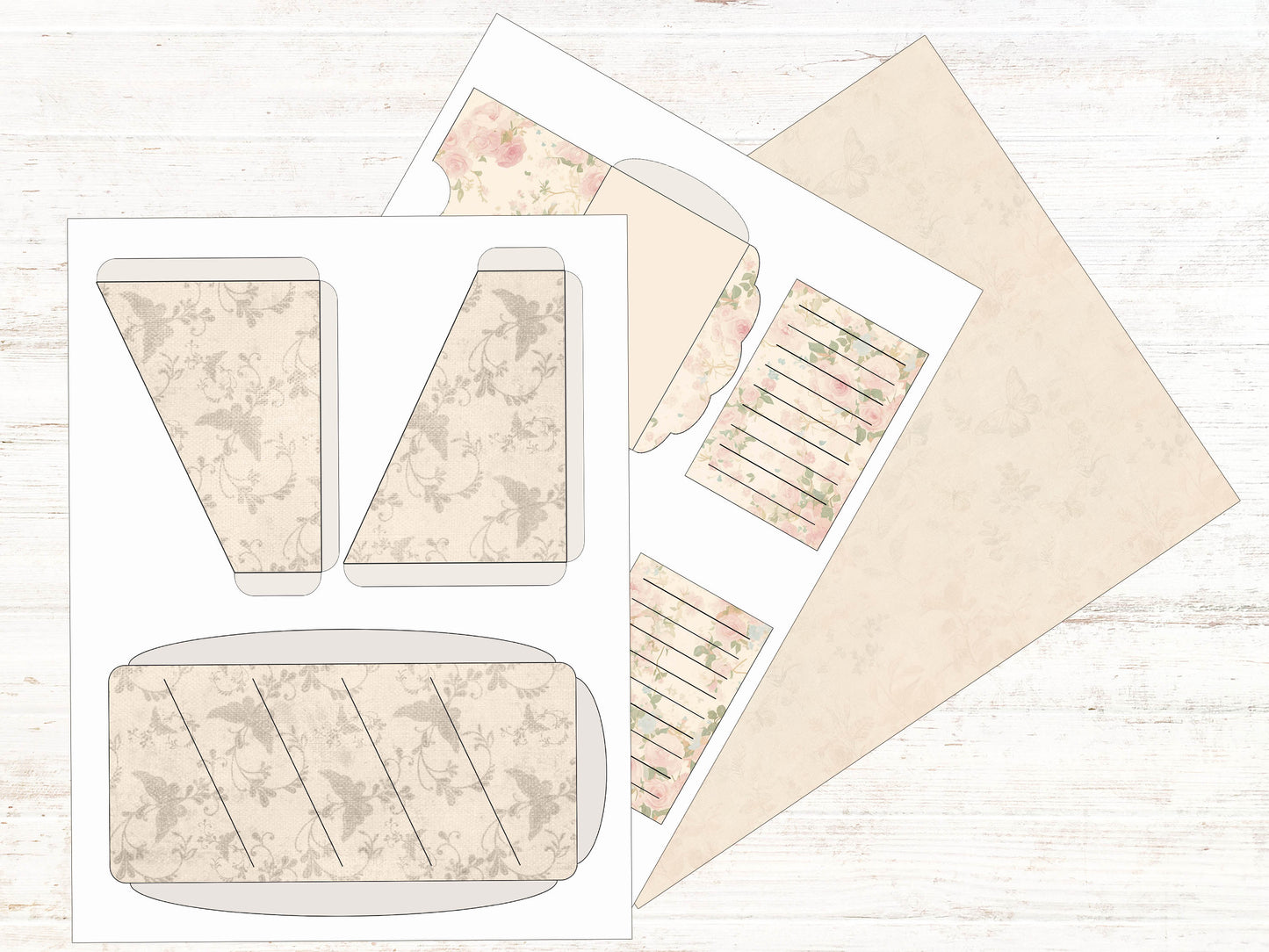 a set of envelopes and a cut out of paper